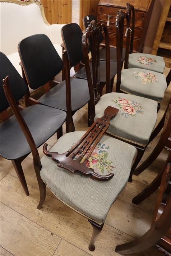 A set of four late Victorian salon chairs with pierced splats and floral tapestry seats